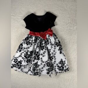 Nannette Elegant Black and White Dress with Red Accent